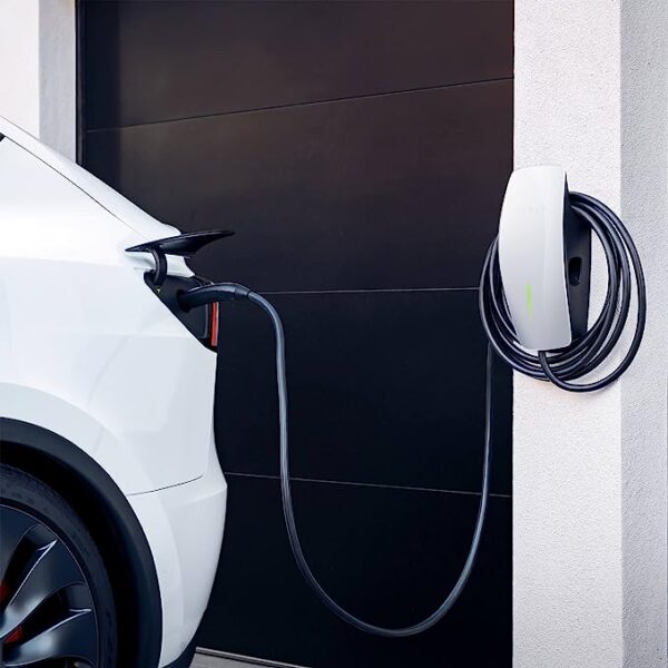tesla wall connector plugged to a tesla car